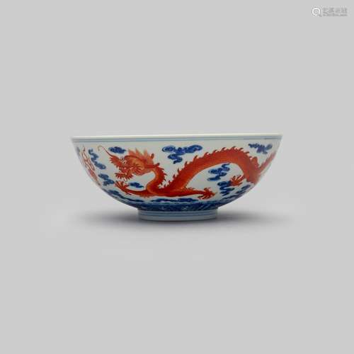 An iron-red enammelled and underglaze blue 'dragon' bowl