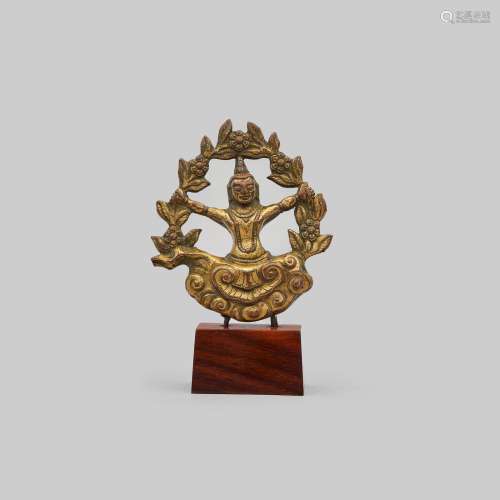 A gilt bronze figure of a Bodhisattva