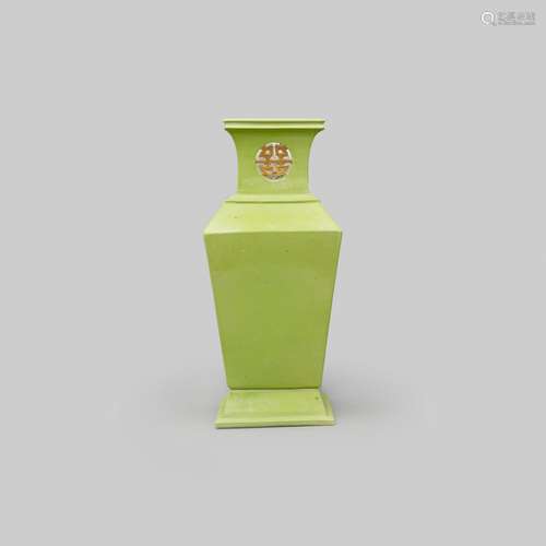 A lime-green glazed square vase