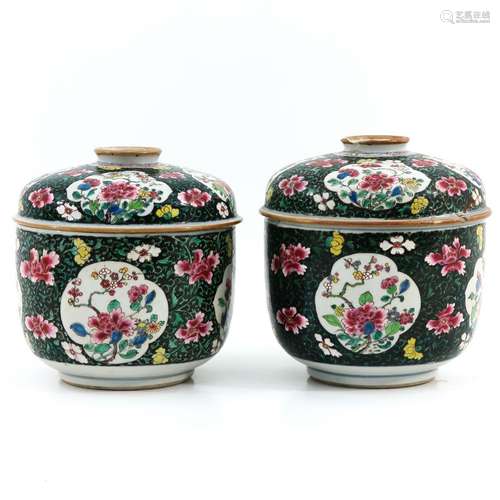 A Pair of Famille Verte Jars with Covers