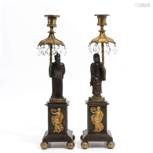 A PAIR OF CANDLESTICKS