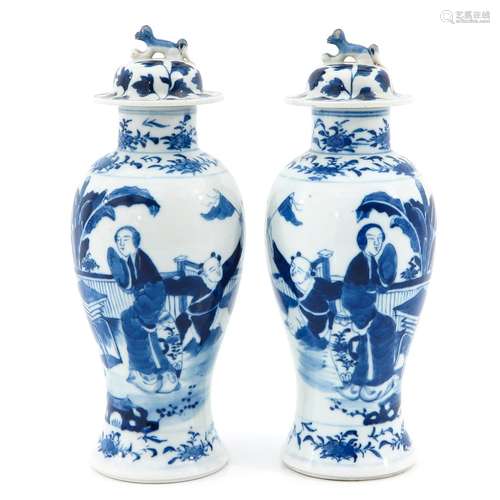 A pair of blue and white vases