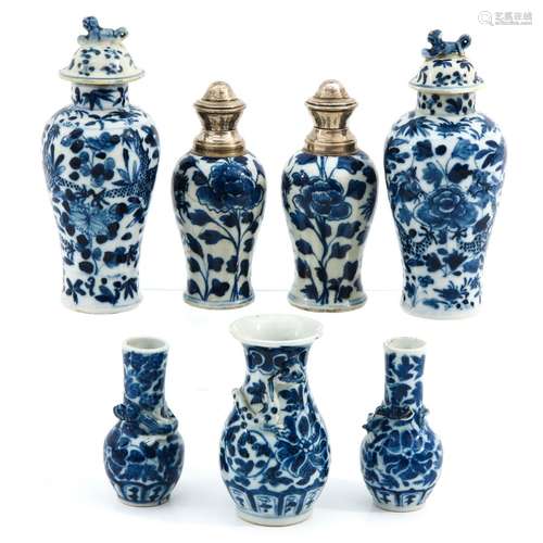 A Collection of 7 Small Vases