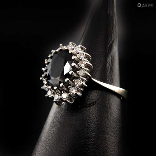 A Ladies 14KG Saphire and Diamond Ring