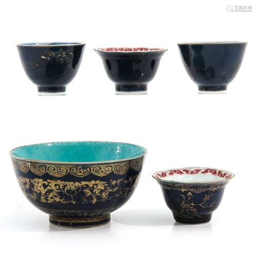 A Collection of 4 Cups and 1 Bowl