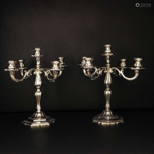 A Pair of Sterling Candlesticks