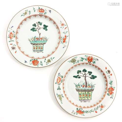 A Pair of Polychrome Decor Plates