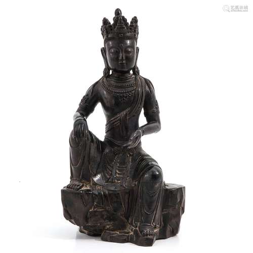 A Carved Zitan Wood Buddha