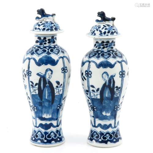 A pair of blue and white vases