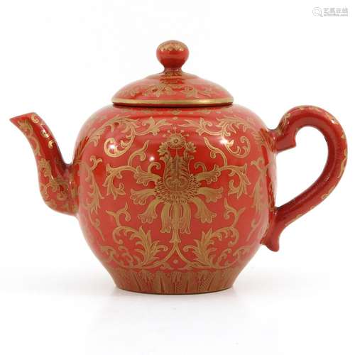 An Orange and Gilt Decor Teapot