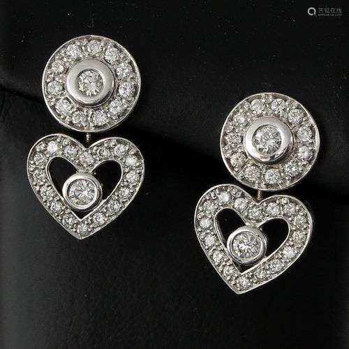 A Pair of 18KG Diamond Earrings