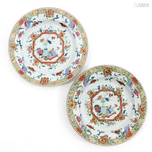 A Pair of Polychrome Decor Plates