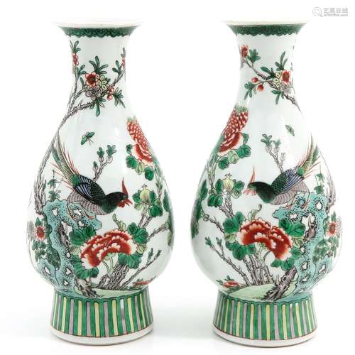 A pair of famille verte vases