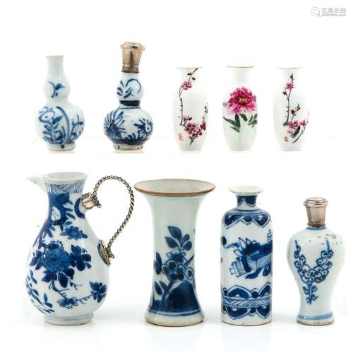 A Collection of 9 Miniature Vases