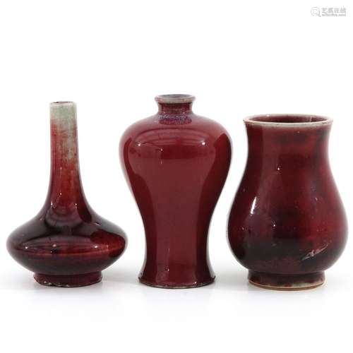 A Collectin of 3 Sang de Boeuf Decor Vases