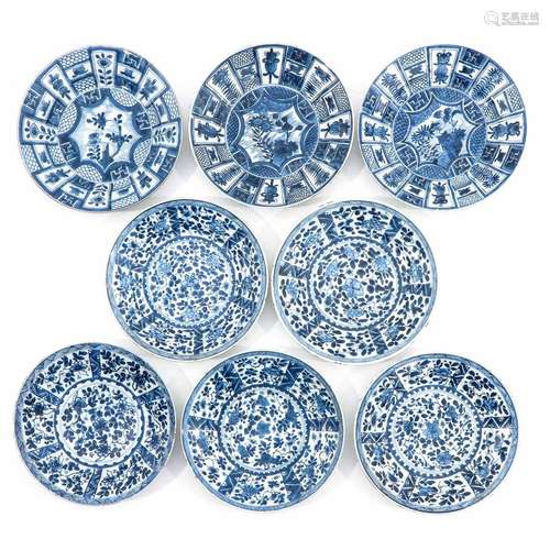 A Collection of 8 Blue and White Plates