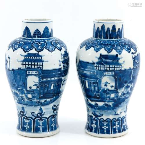 A pair of blue and white vases