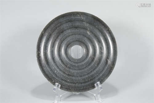 A WARRING STATES PERIOD STYLE JADE BI DISC