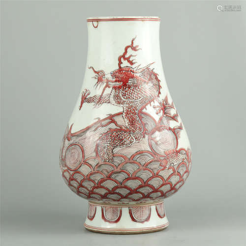 AN IRON RED GLAZE PORCELAIN ZUN