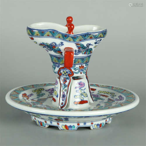 A DOUCAI PORCELAIN WINE CUP AND MATCHING SOUCER