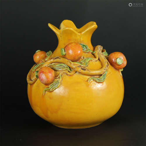 A QING DYN. YELLOW GLAZED PORCELAIN FRUIT-SHAPED VASE