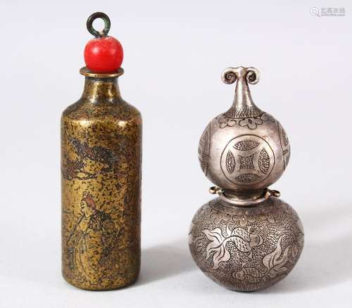 TWO CHINESE METAL SNUFF BOTTLES - one white metal and engrav...