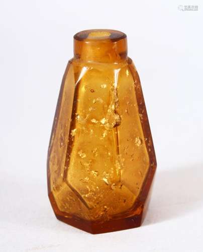 A CHINESE AMBER GLASS & GOLD FLAKE SNUFF BOTTLE, of tape...