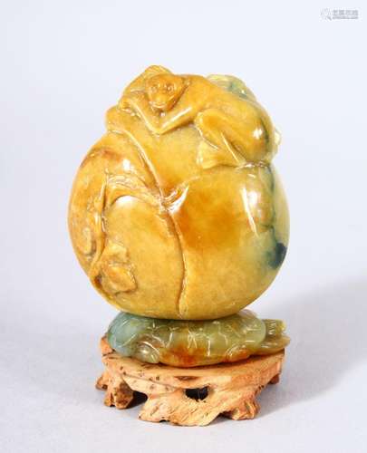 A GOOD CHINESE CARVED JADE MONKEY, PEACH & LOTUS SNUFF B...