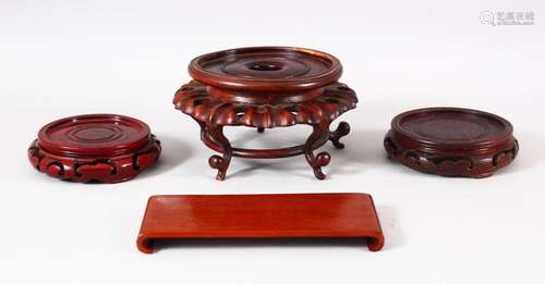 FOUR CHINESE CARVED WOODEN STANDS - 8cm - 8.9cm - 11cm ( cir...