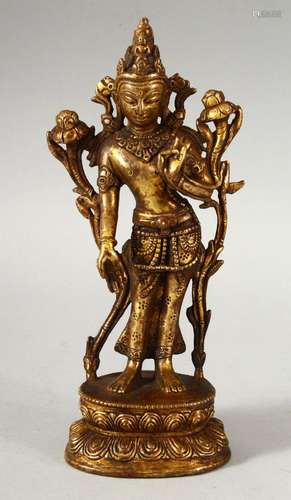 A SINO - TIBETAN GILT BRONZE FIGURE OF BUDDHA / DEITY - 18.5...