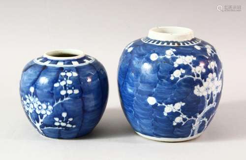 TWO BLUE AND WHITE PRUNUS GINGER JARS, lacking covers,14cm a...