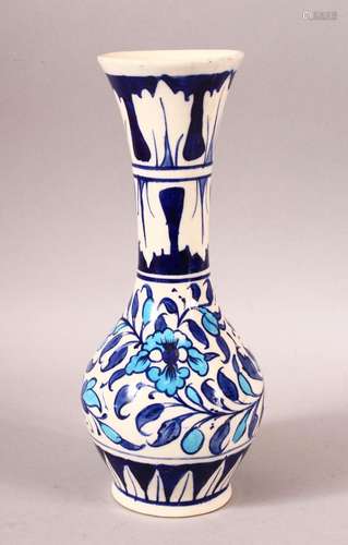 AN ISLAMIC PORCELAIN VASE, blue painted floral decoration in...