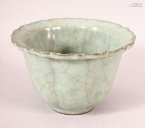 A CHINESE CRACKLE GLAZE CELEDON BOWL, 15cm diameter.