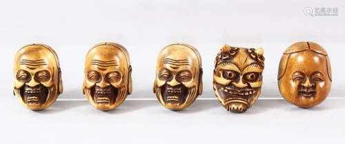 FIVE SMALL JAPANESE CARVED HANNYA / DARUMA MASKS, each appro...