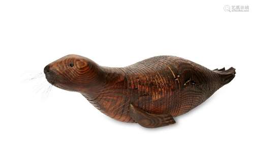 Jeff Soan, an articulated wood model of a seal, 1998, inset ...