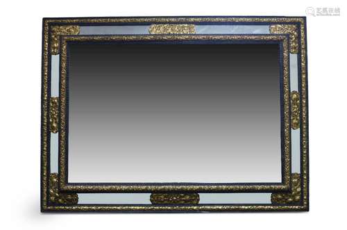 A Dutch ripple moulded and gilt repousse mounted wall mirror...