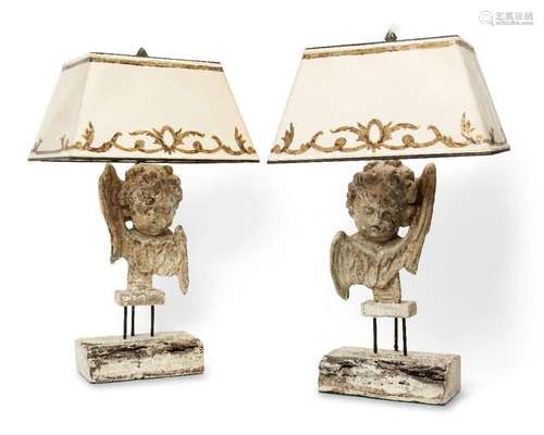 A pair of French carved wood cherub lamps, 20th century, eac...