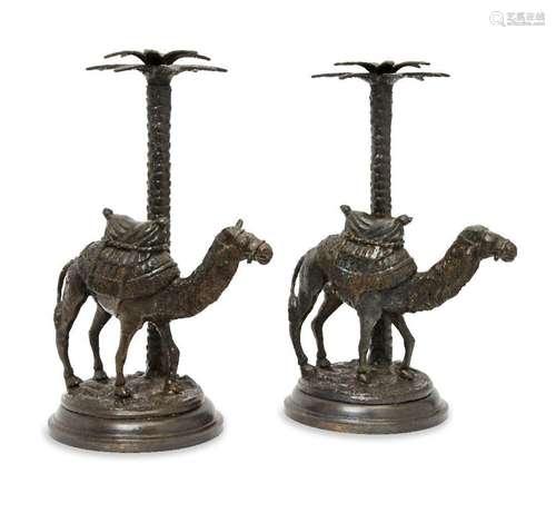 Two bronze candlesticks modelled as camels, late 20th centur...