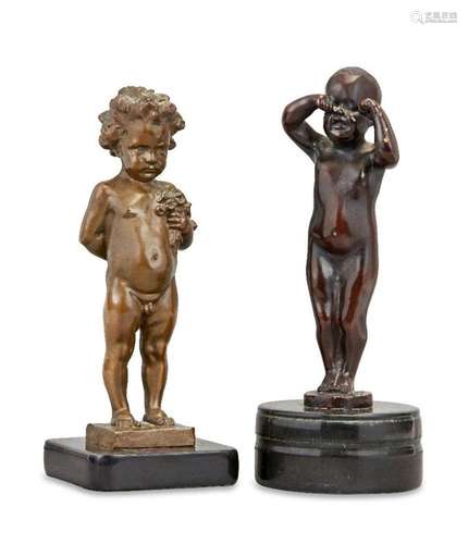 After H Müller, a German bronze model of a boy holding a pos...