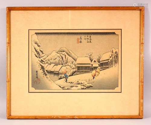 A JAPANESE WOODBLOCK PRINT of a snowy landscape, depicting f...