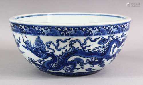 A CHINESE MING STYLE BLUE & WHITE PORCELAIN DRAGON BOWL ...