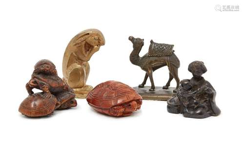 Two Japanese wood netsuke, one modelled as four tortoise, 5c...