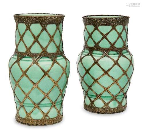 A pair of Japanese green glazed pottery vases, first half 20...
