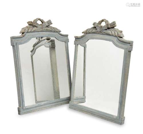 A pair of French Louis XVI style painted mirrors, second hal...