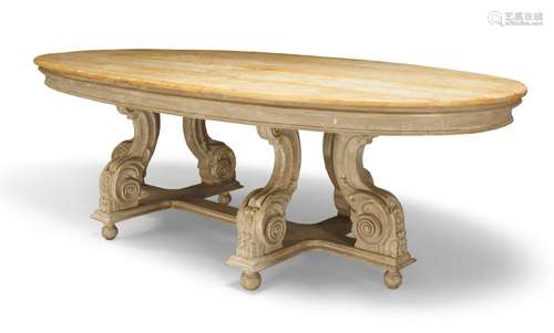 A Continental stripped pine dining table, the oval top raise...