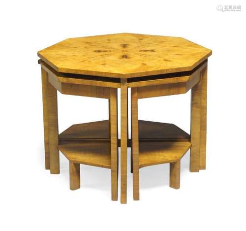 An Art Deco walnut nest of tables, c.1925, the principal tab...