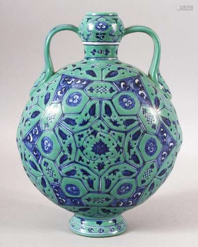 A CHINESE TURQUOISE GROUND TWIN HANDLE PORCELAIN MOON FLASK ...