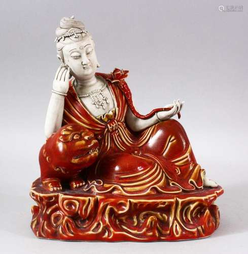 A CHINESE COPPER RED GLAZED PORCELAIN FIGURE OF GUANYIN - gu...