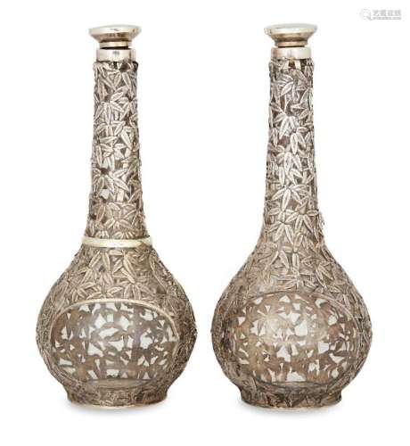 A pair of Japanese export silver overlay glass decanters, ea...
