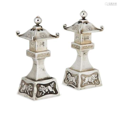 A pair of novelty Japanese silver 'pagoda' salt an...